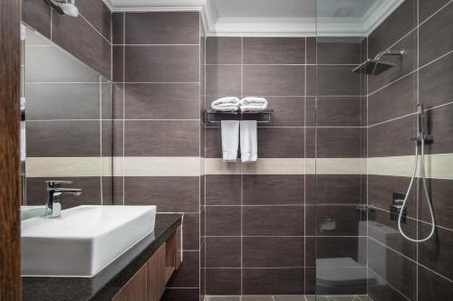 Koupelna v ubytování HM Grand Central Hotel
