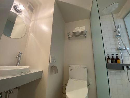 Koupelna v ubytování maejima Hotel
