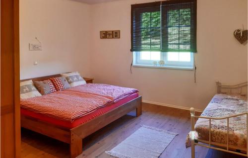 Кровать или кровати в номере Ferienhaus Im Sdburgenland