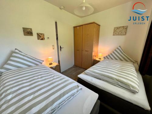 Postel nebo postele na pokoji v ubytování Haus Nina 153 - Ferienwohnung 3