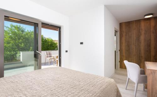 Ένα ή περισσότερα κρεβάτια σε δωμάτιο στο VILLA SUENOS - New & Modern - 2023