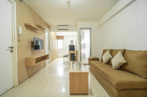 Телевизор и/или развлекательный центр в Premium 2BR @ Bassura City East Jakarta