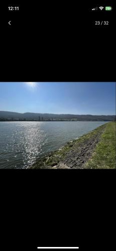 a view of a large body of water at Petite maison chaleureuse des boucles de la Seine in Le Mesnil-sous-Jumièges