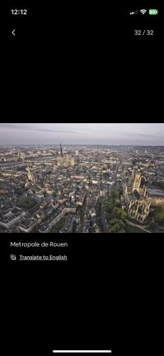 a view of a city from an airplane at Petite maison chaleureuse des boucles de la Seine in Le Mesnil-sous-Jumièges