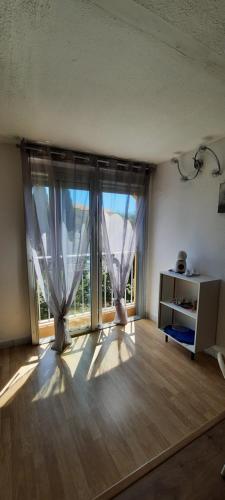 Χώρος καθιστικού στο Studio 4 personnes au Cap-d'Agde