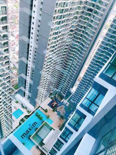 a view of a large building with a beach at rumaKL at Majestic Maxim in Kuala Lumpur