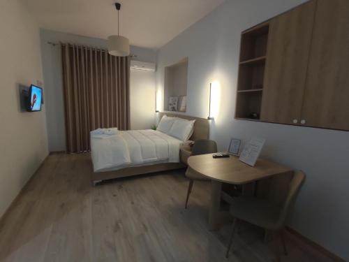 TV a/nebo společenská místnost v ubytování Elvish Garden Boutique B&B