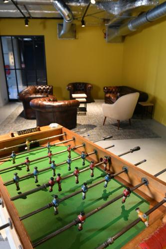 a room with a pool table with balls on it at ibis Styles Namur in Namur