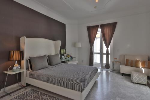 Postel nebo postele na pokoji v ubytování Riad-283 - 5 chambres avec piscine - Marrakech