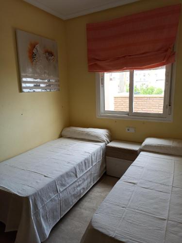 Giường trong phòng chung tại Thalassa Vera Apartment
