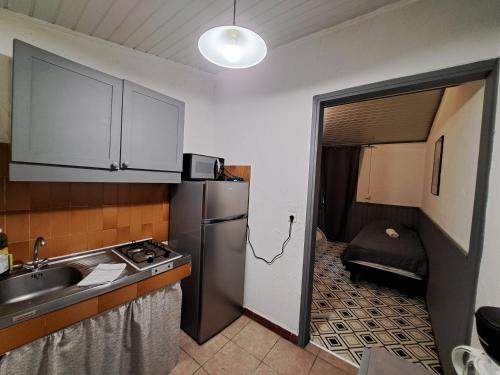 Η κουζίνα ή μικρή κουζίνα στο Bungalows Filippi
