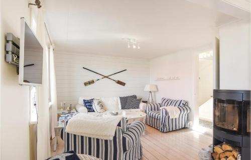 Llit o llits en una habitació de Nice Home In Bovallstrand With 3 Bedrooms And Wifi