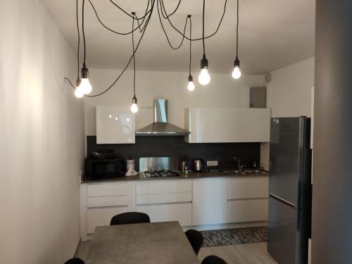 Kuchyň nebo kuchyňský kout v ubytování Casa ToNi