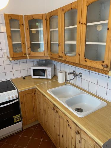 Kuchyň nebo kuchyňský kout v ubytování Global Apartmanház