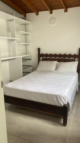 Una cama o camas en una habitación de Gastón Coliving
