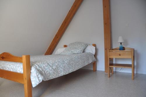 Postel nebo postele na pokoji v ubytování Chambre en duplex (1 pers.)