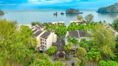 an aerial view of a house on the water at Tanjung Rhu Resort in Tanjung Rhu 