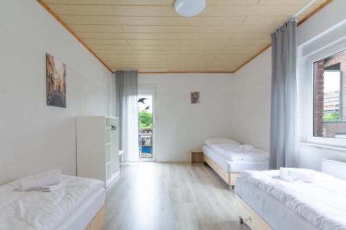 Voodi või voodid majutusasutuse T&K Apartments Oberhausen 2 room Apartments toas