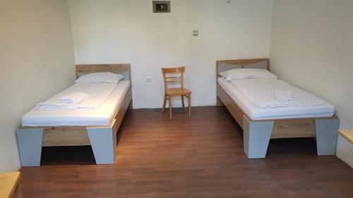 Un pat sau paturi într-o cameră la Speedyrooms Vienna