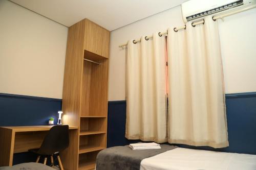 Cama o camas de una habitación en AP 104-A Térreo Completo Aconchegante