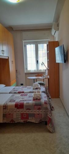 Postel nebo postele na pokoji v ubytování A Casa di Mich