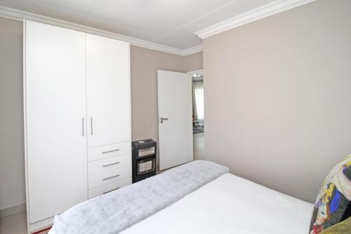 Krevet ili kreveti u jedinici u okviru objekta White Orchid Luxury Apartment