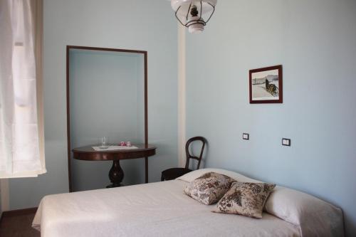 Il Faggio Rosso tesisinde bir odada yatak veya yataklar