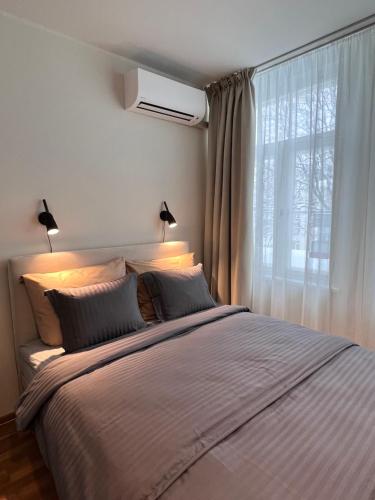 Postel nebo postele na pokoji v ubytování Cozy rooms in Villa Heermeyer