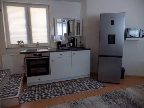 Kuchyň nebo kuchyňský kout v ubytování Studio 40m2, Nähe S Bahn