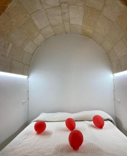 Una cama o camas en una habitación de Le Dimore di via Umberto I