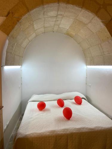 Una cama o camas en una habitación de Le Dimore di via Umberto I