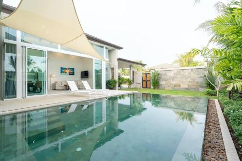 an image of a swimming pool in a house at Peykaa Estate Pool Villa by HCR in Phuket Town
