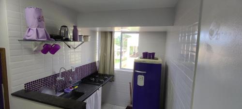 Dapur atau dapur kecil di Guest House Renascer K&W