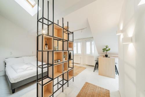 Postel nebo postele na pokoji v ubytování Zeus Design Apartmenthaus