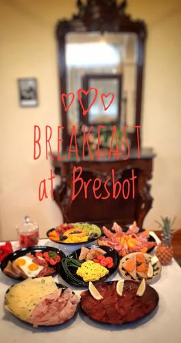 a table with many plates of food on it at Bresbot B&B in Bressana Bottarone