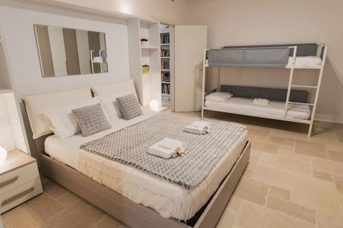 Krevet ili kreveti na kat u jedinici u objektu Shangri-La Polignano a Mare