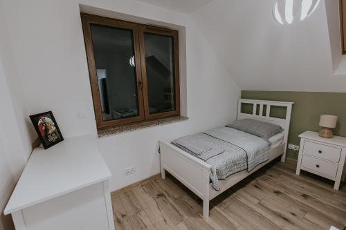Postel nebo postele na pokoji v ubytování Zapomniany Zdrój