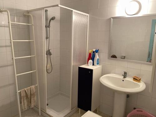 a bathroom with a shower and a sink at Maison la perle de Hammam Sousse in Hammam Sousse
