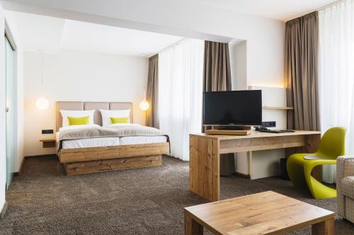 Postel nebo postele na pokoji v ubytování Hotel Rad