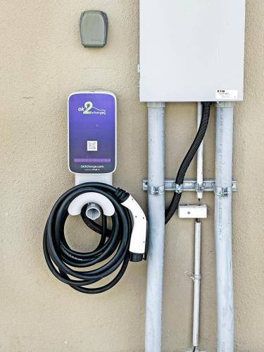 a hose hooked up to a wall with a meter at Vacay Spot experience Luna Sky! 65" TV BAR, BBQ, SHOWER massage jets, music, go to FL Keys in Homestead
