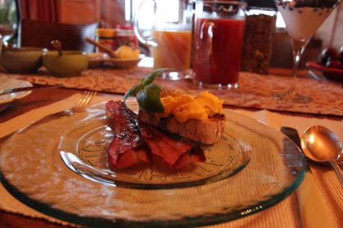 a plate of food on top of a table at Birds Ferry Lodge Luxury B&B in Westport