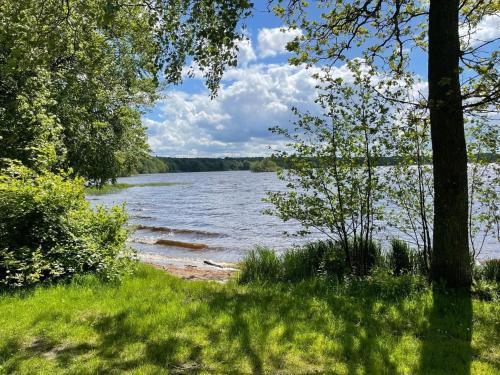 a view of a body of water with trees at 5 person holiday home in Brösarp-By Traum in Brösarp