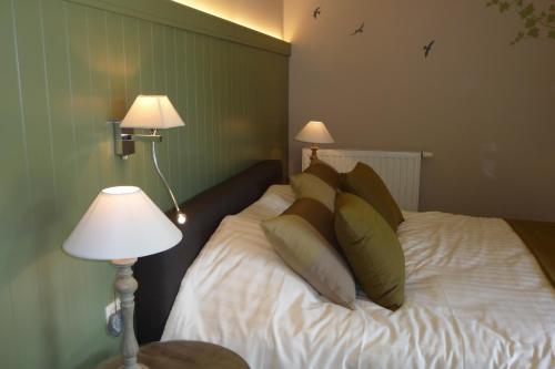 Ein Bett oder Betten in einem Zimmer der Unterkunft B&B Riche Terre