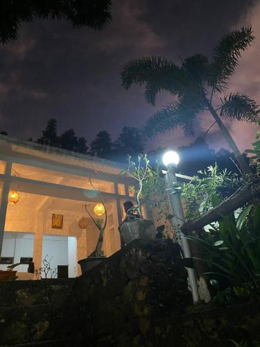a building with a street light in front of it at The Hill View Lombok in Kuta Lombok