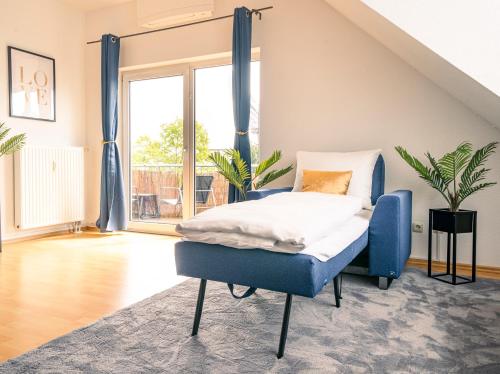 Postel nebo postele na pokoji v ubytování Penthouse-Suite near University
