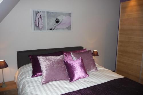 Ein Bett oder Betten in einem Zimmer der Unterkunft B&B Riche Terre