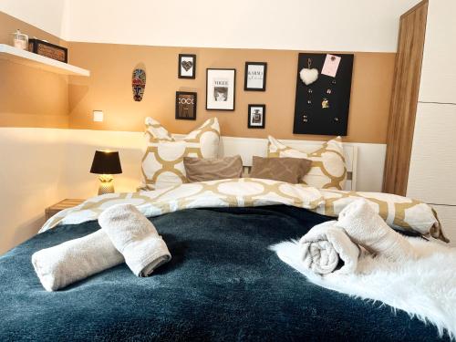 מיטה או מיטות בחדר ב-Panorama-Residenz, Pool, inkl ActivCard