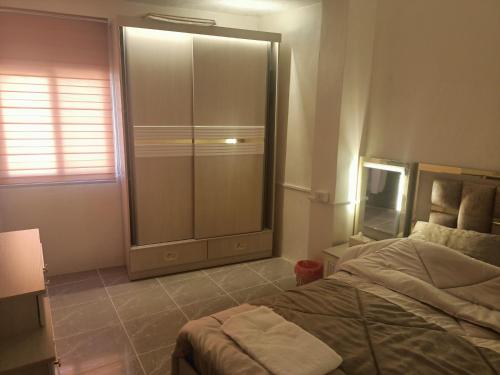 Postel nebo postele na pokoji v ubytování hostel ـ Karak dream