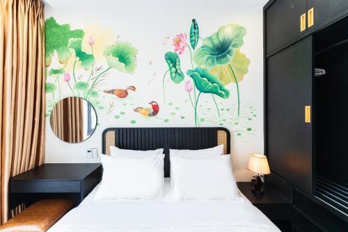 Ένα ή περισσότερα κρεβάτια σε δωμάτιο στο Q Boutique Hotel