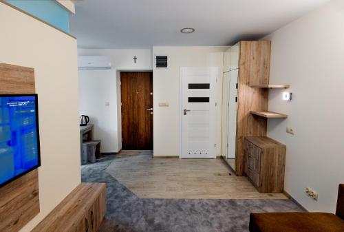 Μια τηλεόραση ή/και κέντρο ψυχαγωγίας στο Apartament u Roberta Bieńka